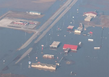 Multiple truck stops are under water because of historic flooding