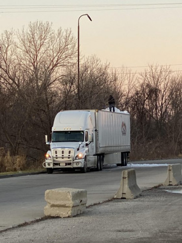 Don’t risk personal safety to avoid fines for not removing snow/ice from trailer roofs