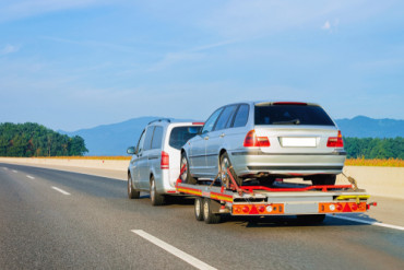 Is it troublesome to rent a car trailer transport to move your car