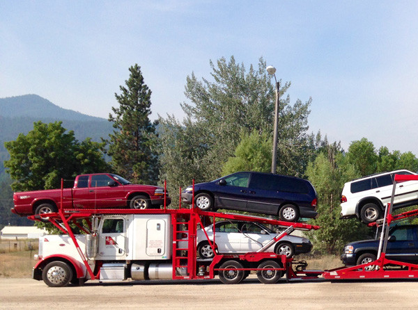car hauling company truck and trailer